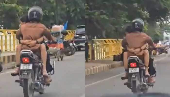 The shocking clip showed a woman sitting on the fuel tank of the bike while tightly hugging the rider as they rode through a busy road in broad daylight. A viral video from Gorakhpur, Uttar Pradesh, has brought a young couple under spotlight for performing a dangerous stunt on a motorcycle.