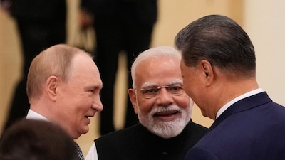 They say a photograph speaks a thousand words, and if the recent snaps of Prime Minister Narendra Modi, laughing and chatting with Russian President Vladimir Putin and his Chinese counterpart Xi Jinping, are anything to go by, the message to the West was loud and clear—the power axis is subtly shifting away from Donald Trump's America.