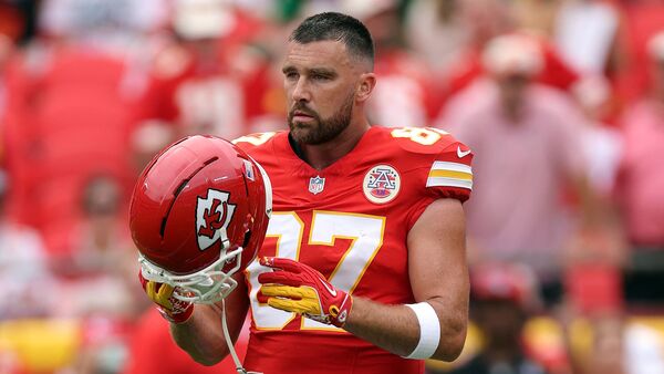 Travis Kelce, Kansas City Chiefs star tight end has landed in trouble after a controversial moment during a recent NFL game against the Philadelphia Eagles. The league fined Kelce $14,491 for an “obscene gesture” made during the Chiefs' matchup against the Eagles, sparking widespread debates.