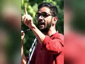 Umar Khalid's lawyer told a Delhi court he was accused in the 2020 riots conspiracy due to a WhatsApp group membership. Other individuals at a related meeting were not charged. Khalid's counsel argued he even tried to de-escalate the situation. The court will hear further arguments on October 14. Khalid is accused under UAPA.Umar Khalid's lawyer told a Delhi court he was accused in the 2020 riots conspiracy due to a WhatsApp group membership. Other individuals at a related meeting were not charged. Khalid's counsel argued he even tried to de-escalate the situation. The court will hear further arguments on October 14. Khalid is accused under UAPA.Umar Khalid was made an accused in the North East Delhi riots 2020 larger conspiracy case by virtue of being a member of a WhatsApp group, his counsel told the Karkardooma Court in Delhi on Thursday. He added that other persons who were present during the same meeting have not been named as accused by the Delhi Police. <br><br>These submissions were made before the court during arguments on the charge. <br><br>Umar Khalid is an accused under UAPA over the alleged conspiracy of the North East Delhi riots of 2020. <br><br>Additional Sessions Judge (ASJ) Sameer Bajpai, after hearing the submissions, listed the matter for further arguments on October 14. <br><br>During arguments, Senior Advocate Tridip Pais, representing Khalid, contended that Umar Khalid has been made an accused by the police on the basis of being a member of a WhatsApp group. <br><br>However, the other similarly situated persons are not made accused by the police, he argued.<br><br>Senior Counsel during the arguements referred to a media report to claim that other persons were present in the meeting linked with the alleged Conspiracy. Though have not been accused by the Delhi Police.<br><br>It was further argued that Umar Khalid even tried to de-escalate the situation and asked not to protest. However, he did not have control over others.<br><br>On Wednesday, it was argued that he wasn't even present at the