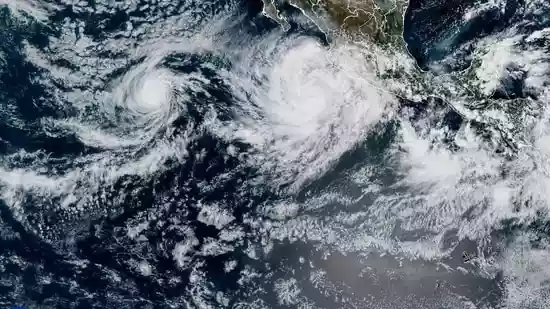 US forecasters are keeping a careful eye on a wide region of low pressure in the central tropical Atlantic, which they believe has a strong likelihood of turning into Tropical Storm Jerry this week. Formerly classified as AL95, the disturbance has a seventy percent probability of developing into a tropical storm within the next seven days, according to the National Hurricane Center as of Monday, Oct. 6.US forecasters are keeping a careful eye on a wide region of low pressure in the central tropical Atlantic, which they believe has a strong likelihood of turning into Tropical Storm Jerry this week.Formerly classified as AL95, the disturbance has a seventy percent probability of developing into a tropical storm within the next seven days, according to the National Hurricane Center as of Monday, Oct. 6.The system is rapidly moving west-northwest across the Atlantic, creating a wide region of scattered precipitation and thunderstorms.The climate is conducive to slow growth, and in the coming days, a tropical depression is probably going to emerge.