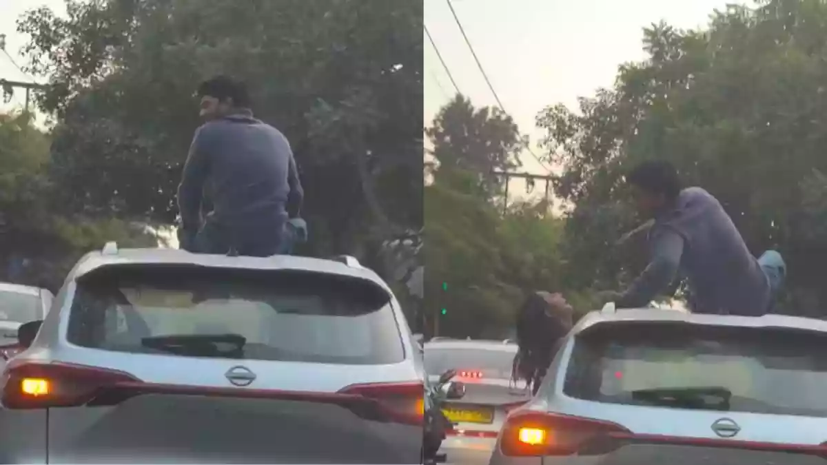 WATCH | Delhi Man Climbs Onto Car Roof In Dangerous Stunt