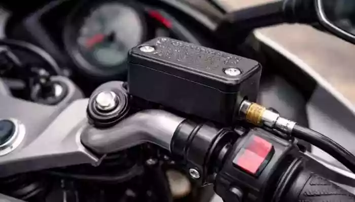 What is this small rectangular box near some motorcycle brakes