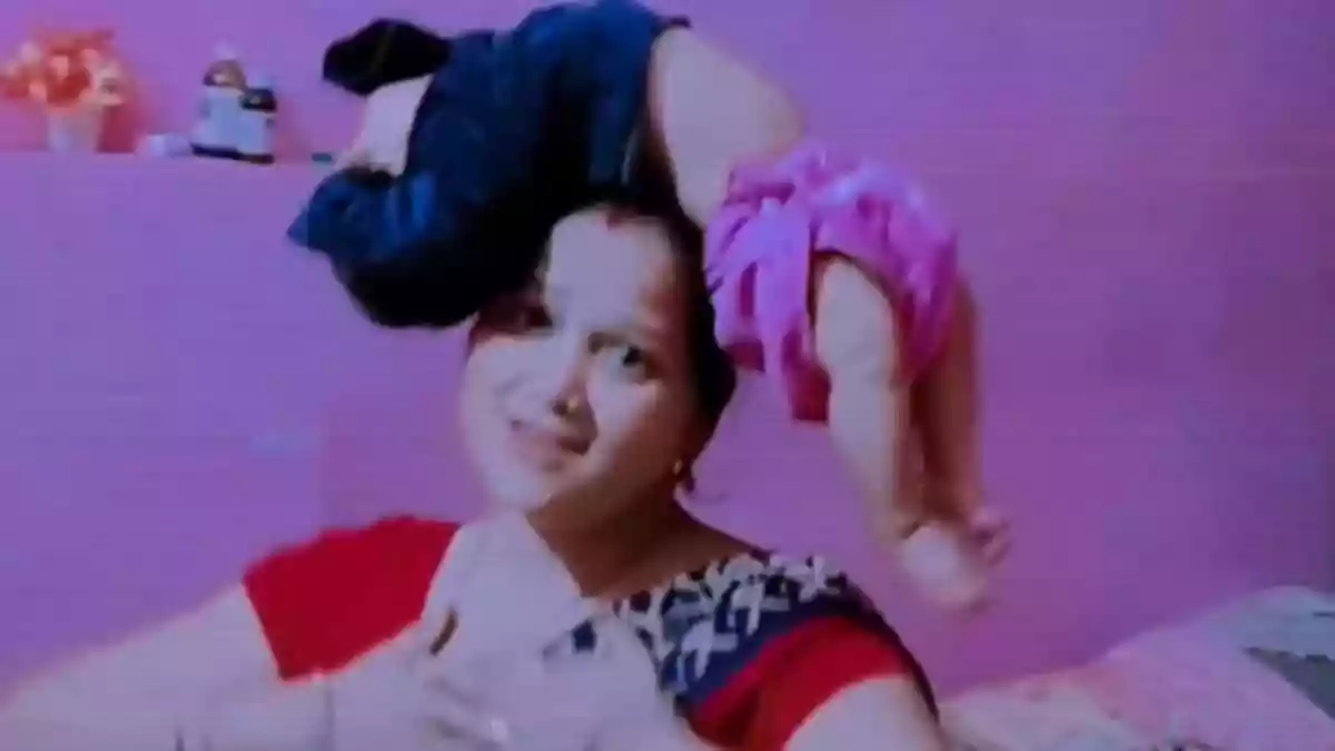 Woman Balances Infant On Head In Iconic ‘Baahubali’ Pose