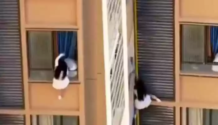 Woman Dangles From High-Rise To Escape Lover’s Wife - Watch