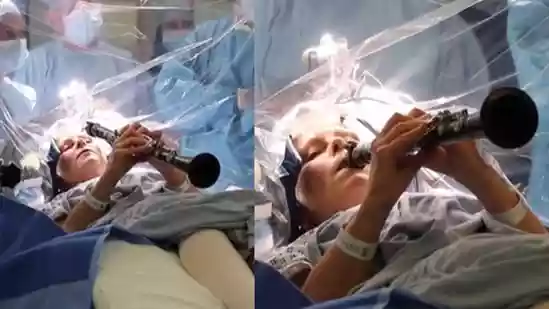 Woman with Parkinson’s disease plays clarinet during brain surgery in London