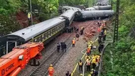 Eleven people were killed and two others injured after a test train hit a group of maintenance workers on the track early on Thursday in China's southwestern