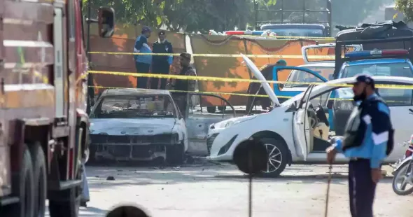 Twelve persons were killed and 27 injured in suicide bombing outside a court in Pakistani capital Islamabad, AFP quoted the country's Internal Minister Mohsin