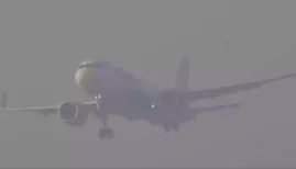 A massive winter storm sweeping across the US has led to over 14,000 flight cancellations and widespread power outages, prompting emergency declarations in ten