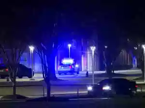 The shooting, which occurred around 9:15 p.m. inside a room at the Hugine Suites complex, prompted university officials to place the campus on lockdown for