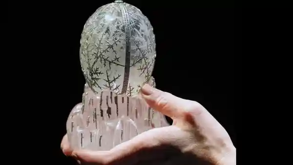 One of the few remaining Fabergé eggs - exquisitely crafted ornaments made from metals and gemstones - has been sold for £22.9 million ($30