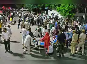 A devastating fire in the trauma ICU of Jaipur's SMS Hospital on Sunday night claimed six lives and left five patients critical. A suspected short circuit rapidly spread toxic gases, complicating the evacuation of comatose patients. Relatives alleged severe negligence, including staff fleeing and a lack of fire-fighting equipment, demanding answers for the tragic incident.A devastating fire in the trauma ICU of Jaipur's SMS Hospital on Sunday night claimed six lives and left five patients critical. A suspected short circuit rapidly spread toxic gases, complicating the evacuation of comatose patients. Relatives alleged severe negligence, including staff fleeing and a lack of fire-fighting equipment, demanding answers for the tragic incident.A devastating fire tore through the trauma ICU of Jaipur's Sawai Man Singh (SMS) Hospital late on Sunday night, claiming six lives and leaving five patients in critical condition. <br><br>The blaze, which erupted on the hospital's second floor, sent patients, relatives, and hospital staff into chaos as smoke and toxic gases quickly engulfed the ward.<br><br>Authorities have launched an investigation to determine the exact cause of the fire, with a short circuit suspected, though confirmation will only come after forensic analysis.<br><br><h4>Chaos erupts in the ICU</h4>SMS Hospital Trauma Centre In-charge Anurag Dhakad told ANI that the fire began in the trauma ICU and spread rapidly. <br><br>“Our trauma centre has two ICUs on the second floor: a trauma ICU and a semi-ICU. We had 24 patients there; 11 in the trauma ICU and 13 in the semi-ICU. A short circuit occurred in the trauma ICU, and the fire spread rapidly, releasing toxic gases,” he said.<br><br><strong>Also read: Jaipur: Six patients killed as fire breaks out in ICU of hospital<br></strong><br>Most of the patients were comatose, complicating evacuation. <br><br>Dhakad described the desperate rescue efforts: “Our trauma centre team, our nursing officers, and ward boys, immediately rescued them on trolleys and brought as many patients as we could out of the ICU and shifted them to another location. Six of those patients were very critical; we tried very hard to revive them with CPR, but they couldn't be saved.”<br><br>According to Dhakad, two of the deceased were women and four were men. Five patients remain critical after being evacuated from the ward.<br><br><h4>Allegations of negligence surface</h4>As the hospital struggled to contain th