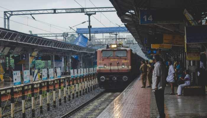 A disturbing video of young men pulling off a dangerous stunt on passengers on a moving train passing through Nagri Halt in Bihar has caught the Internet's attention. The viral video shows two men standing beside the railway tracks near Nagri Halt, armed with sticks. As the train passes by, one of them is seen waiting to strike passengers sitting on the footpegs near the train's doors. As it speeds past, one of them takes aim and hits unsuspecting passengers sitting on the footboards near the doors. The latter half of the video features the accused in custody, all for reel videos. The entire act appears to be staged for a social media reel.
