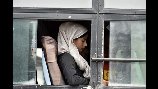A packed bus ride in peak summer highlights corruption and the unique experiences of travel, blending discomfort with poetic moments. ‘Aage peeche ho ke baith jaao, six sawaari ki seat hai’. (Please adjust and make room for the sixth passenger).