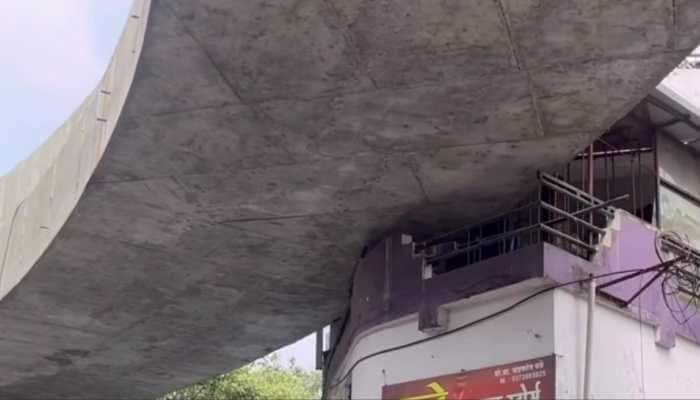 A viral video shows a new flyover in Nagpur passing through a house balcony. The NHAI has now clarified that the balcony is an 
