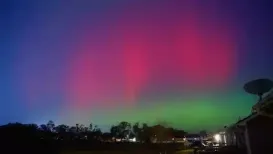 A strong solar storm triggered a dazzling display of colourful auroras across various parts of the US. The mesmerising views were captured by people and shared