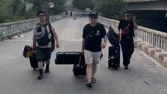 An Indian punk band has safely crossed the Indo-Nepal border after being caught in the midst of violent protests in Kathmandu. The group, known as Street Stories, shared a short video on Instagram in which they could be seen walking across the border while expressing their relief.