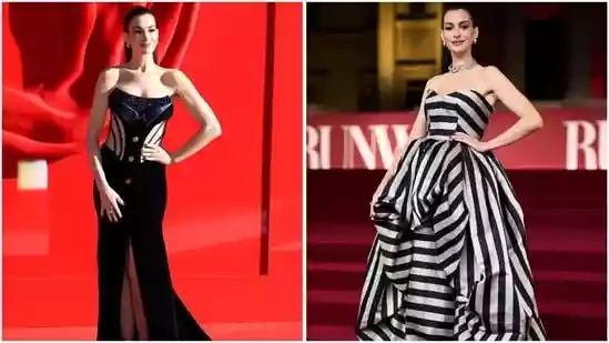 Anne Hathaway dials up the heat in two designer looks for London premiere