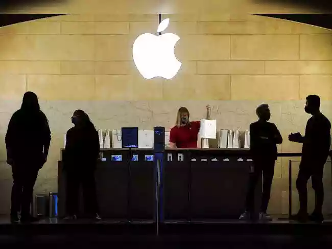 Apple Inc. has cut dozens of jobs in its global sales division to streamline how it serves businesses, educational institutions and government agencies