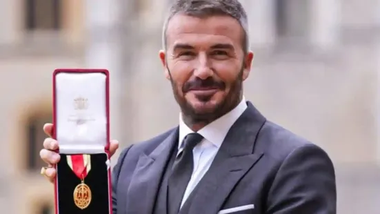 England and Manchester United legend David Beckham was officially knighted on Tuesday as the celebrated footballer added yet another feather to his decorated