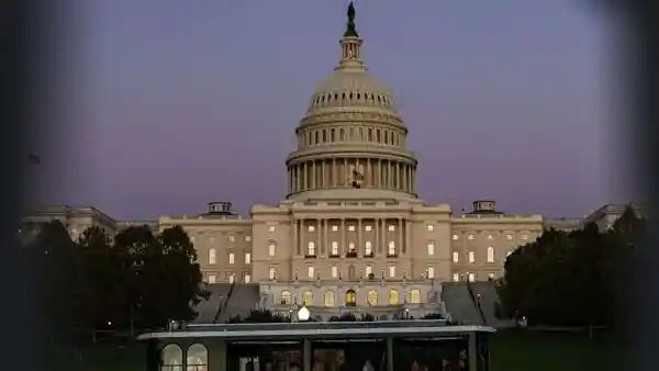 Arizona's Democratic senators, Mark Kelly and Ruben Gallego, had a heated confrontation with Republican House Speaker Mike Johnson on Wednesday, as the U.S. government shutdown entered its eighth day. The exchange took place in a hallway and focused on Johnson's decision to delay swearing in the Democrats' newest congresswoman-elect until the Senate resolves the impasse and reopens the government.Arizona's Democratic senators, Mark Kelly and Ruben Gallego, had a heated confrontation with Republican House Speaker Mike Johnson on Wednesday, as the U.S. government shutdown entered its eighth day.The exchange took place in a hallway and focused on Johnson's decision to delay swearing in the Democrats' newest congresswoman-elect until the Senate resolves the impasse and reopens the government.Also Read: Is Trump sick? US President to undergo ‘physical exam' as health concerns lingerThe tense six-minute exchange was marked by sharp insults and forceful cross-talk, highlighting the deep divisions between the two parties over how to move forward with reopening the federal government. Each side remains firmly entrenched in its position, making it clear how difficult it will be to break the deadlock.