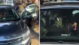 A few federal agents are receiving backlash after a they were spotted detaining a man and then driving off with a toddler in the backseat