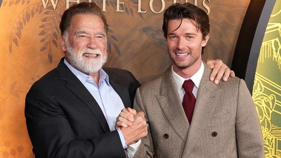 Arnold Schwarzenegger says that his son Patrick's infamous nude scene in The White Lotus season 3 took him by surprise. The success of The White Lotus season 3 ensured that Patrick Schwarzenegger was no longer just known as the son of Arnold. The actor won acclaim for his role on the show, and also ignited some social media fervour with his bare-naked scene. In a recent interaction with Variety, Arnold said the scene took him by surprise when he first saw it, but he was able to connect it with his own career choices.