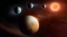 Astronomers have observed a planetary system that challenges current planet formation theories, with a rocky planet that formed beyond the orbits of its