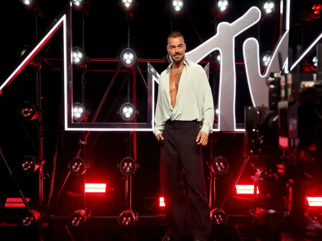 At the 2025 MTV VMAs, Ricky Martin took home the inaugural Latin Icon Award, wowing the audience with his timeless performance, and highlighting his lasting industry impact. Martin performed VMA-winning song Livin' La Vida Loca and dedicated the award to his four children. Ricky Martin's music and acting career has helped him built a multi-million empire and carve a niche for himself in the US music industry.