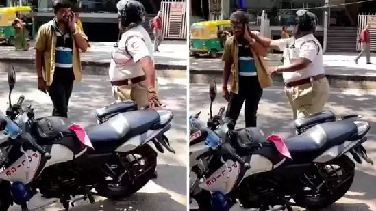 <h4>Bengaluru traffic police slaps auto driver over accident, viral video sparks outrage</h4><h4>Many on social media have tagged Bengaluru