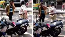<h4>Bengaluru traffic police slaps auto driver over accident, viral video sparks outrage</h4><h4>Many on social media have tagged Bengaluru