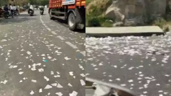 Biker confronts students for throwing paper from school bus