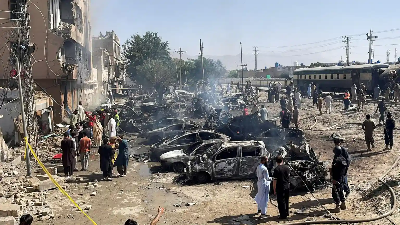 At least 20 people have been killed and 70 others injured in an explosion targeting a train transporting military personnel in Pakistan