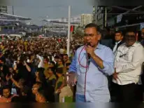 Bangladesh's BNP party celebrates a significant victory in recent polls. Party spokesperson Sayrul Kabir Khan declared it a triumph for democracy