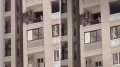 A video showing a man allegedly cutting part of a structural column from the balcony of a high-rise apartment has sparked shock and concern online. The clip