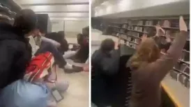A chilling video doing the rounds on social media shows the moment cops rescued terrified Brown University students hiding in a library during a mass shooting