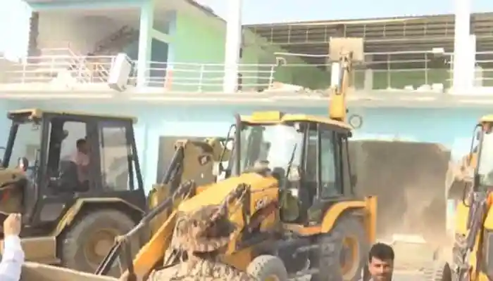 Bulldozer action was taken on Dr. Nafees' property in Bareilly after his arrest over September 26 protests. Heavy security ensured law and order as authorities cleared alleged encroachments amid recent demonstrations. In a recent development, Bulldozer action on Friday was carried out on Dr. Nafees' property in Bareilly following his arrest in connection with the September 26 protests. The official said that adequate force had been stationed to maintain law and order during the action.