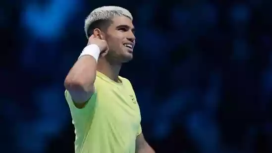 Carlos Alcaraz took a major step toward ending the 2025 season as the world's top-ranked player after grinding out a 6-7 (2), 7-5