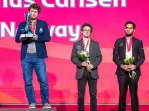 Chess champion Carlsen wins record-extending 9th title