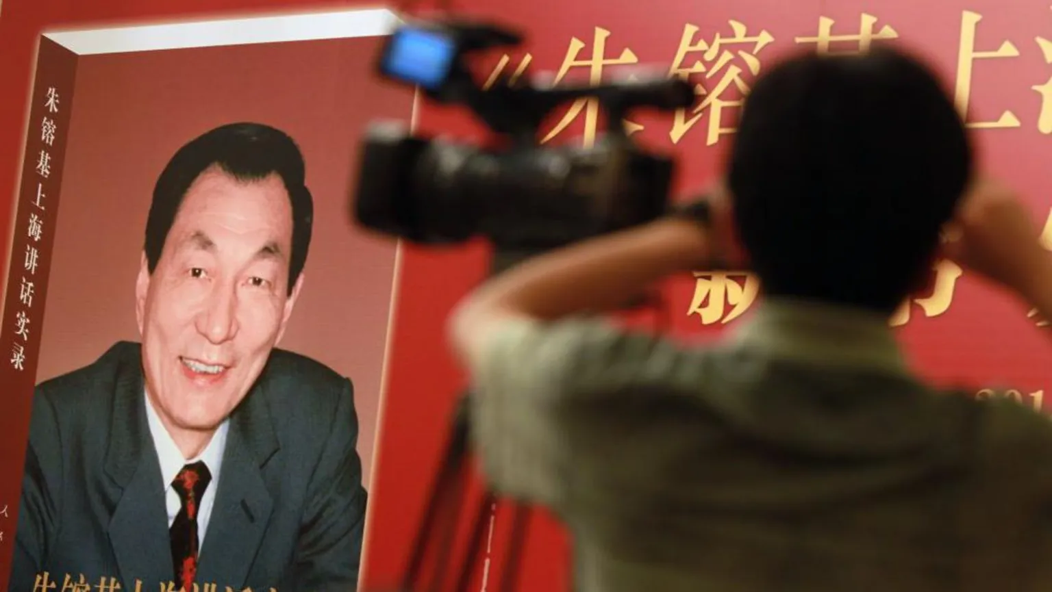 China censors public mourning as it holds former premier's funeral