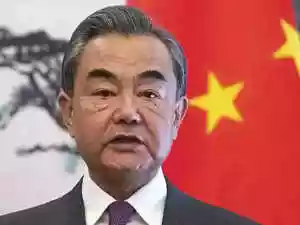In a strategic warning, China's lead diplomat, Wang Yi, advised Germany against relying on 'microphone diplomacy' amid the postponement of the German foreign