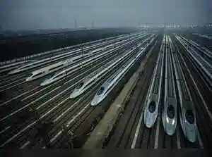 China is rapidly expanding its ultrahigh-voltage power grid, building over 40 lines capable of transmitting more electricity than any in the U.S. This ambitious infrastructure project, driven by a surge in clean energy adoption and electric vehicle use, moves power from western renewable sources to eastern population centers.China is rapidly expanding its ultrahigh-voltage power grid, building over 40 lines capable of transmitting more electricity than any in the U.S. This ambitious infrastructure project, driven by a surge in clean energy adoption and electric vehicle use, moves power from western renewable sources to eastern population centers.In China, the longest ultrahigh-voltage power line stretches more than 2,000 miles from the far northwest to the populous southeast -- the equivalent of transmitting electricity from Idaho to New York City.<br><br> The power line starts in a remote desert in northwest China, where vast arrays of solar panels and wind turbines generate electricity on a monumental scale. It snakes southeast, following an ancient river between mountain ranges before reaching Anhui province near Shanghai, home to 61 million people and some of China's most successful electric car and robot manufacturers.<br><br> That's a single power line. China has 41 others. Each is capable of carrying more electricity than any utility transmission line in the United States. That's partly because China is using technology that makes its lines far more efficient than almost anywhere else in the world. The feat is owed to China's ambitious national energy policies and the fact that few residents along the path of these lines dare object -- even though the lines emit static electricity that local people said they could feel when holding a metal fishing pole.<br><br> 