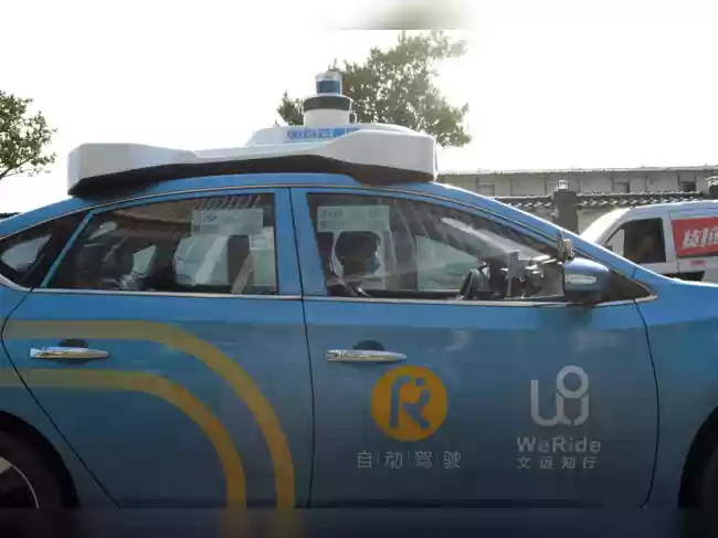 Chinese autonomous driving firm WeRide plans to price its Hong Kong share sale at HK$27.10 per share and raise HK$2.39 billion ($307