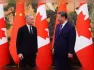 China has clarified its new trade agreement with Canada is not aimed at any other nation. This statement comes after the United States threatened significant