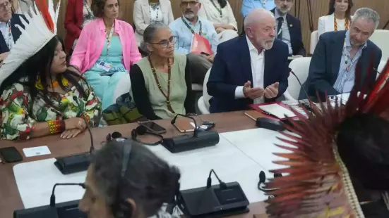“Stop the blah-blah, down with gas in Asia,” chants a group of activists in the hallways of the COP30 venue in Belém, Brazil