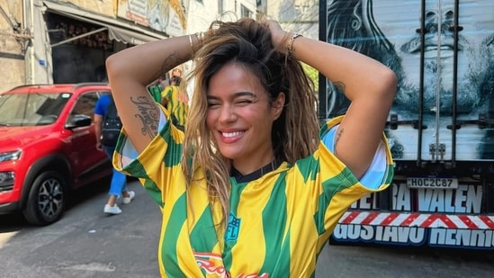 Colombian singer Karol G lit up the stage during the halftime show of the NFL game between the Kansas City Chiefs and the Los Angeles Chargers on Friday night in São Paulo, Brazil. She delivered a high-energy performance featuring some of her biggest hits, including fan-favorite 