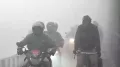 As extreme fog continues to engulf Delhi and NCR, several visuals of people riding bikes and driving their cars in zero visibility have emerged on social media