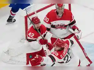 Denmark's hockey team showcased remarkable team spirit and heart in their Winter Olympics clash against the United States. Despite skill and experience gaps