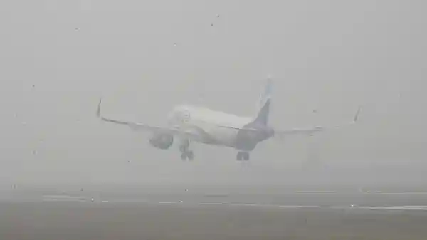 Delhi airport issued a passenger advisory on Friday as dense fog enveloped the national capital during early morning hours. The haze reduced visibility