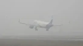 Delhi airport issued a passenger advisory on Friday as dense fog enveloped the national capital during early morning hours. The haze reduced visibility